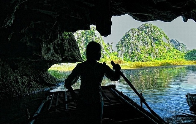 Visitors can enjoy spectacular mountain ranges and caves from their boat